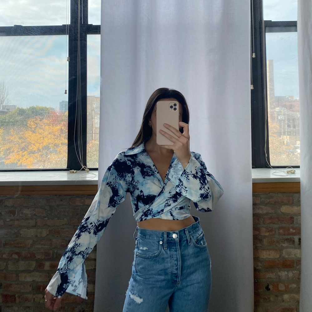Patterned blue wrap top
